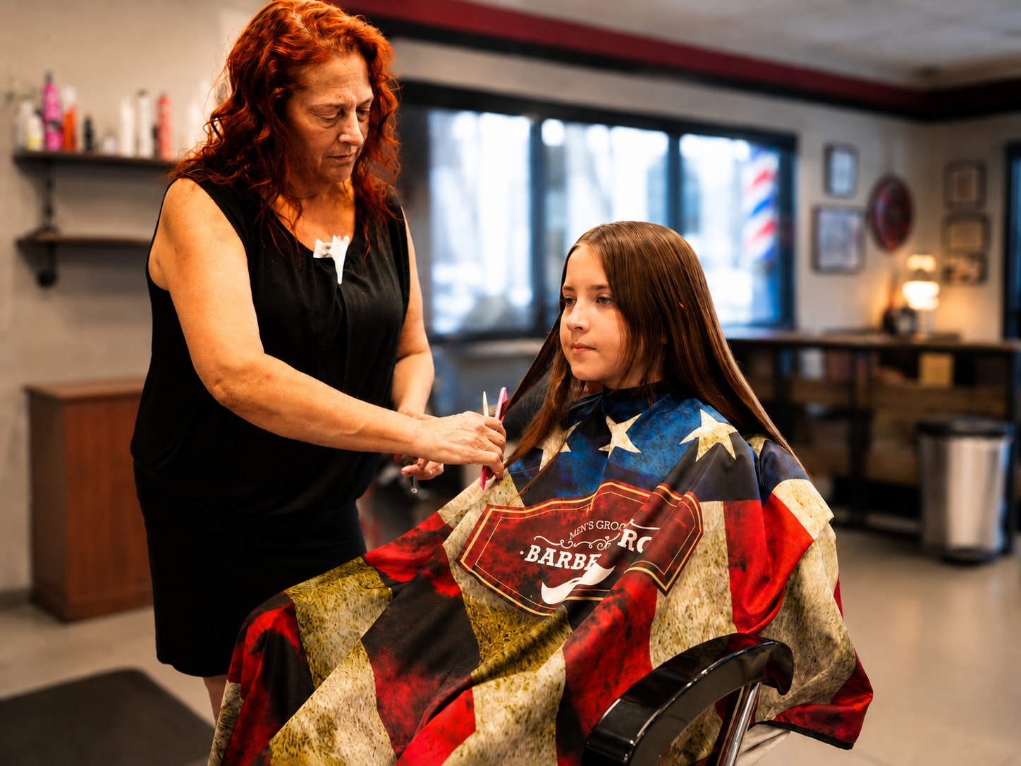 A young girl getting her hair cut at TeamClips